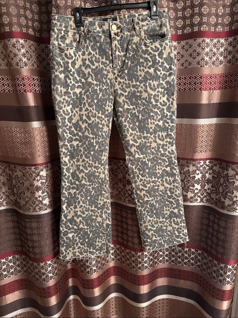 Kit From the Kloth Leopard Print Kelsey Flare Jeans raw hem